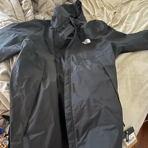 Woman’s North Face Raincoat Coat